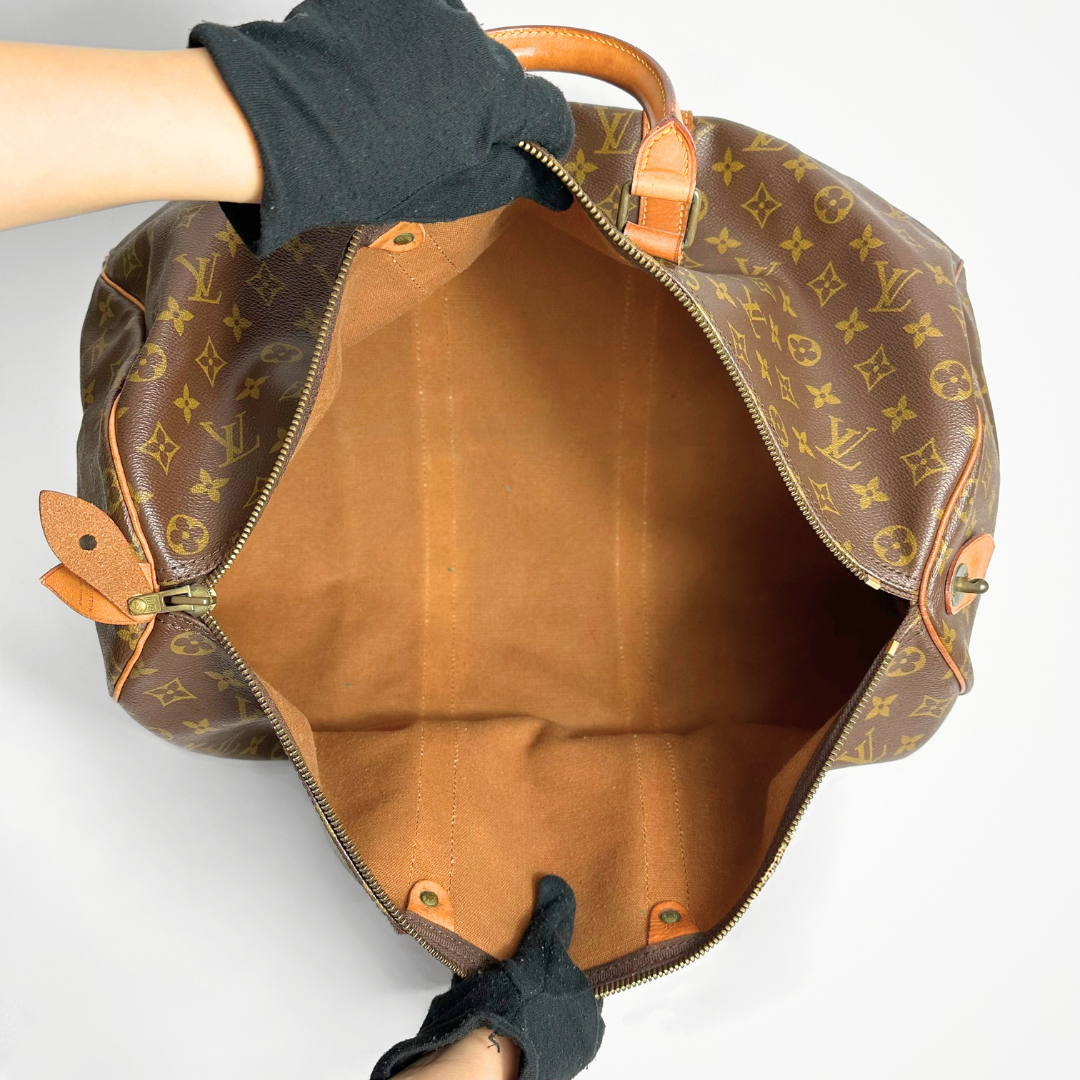 Louis Vuitton Keepall 50 Vintage on a white background