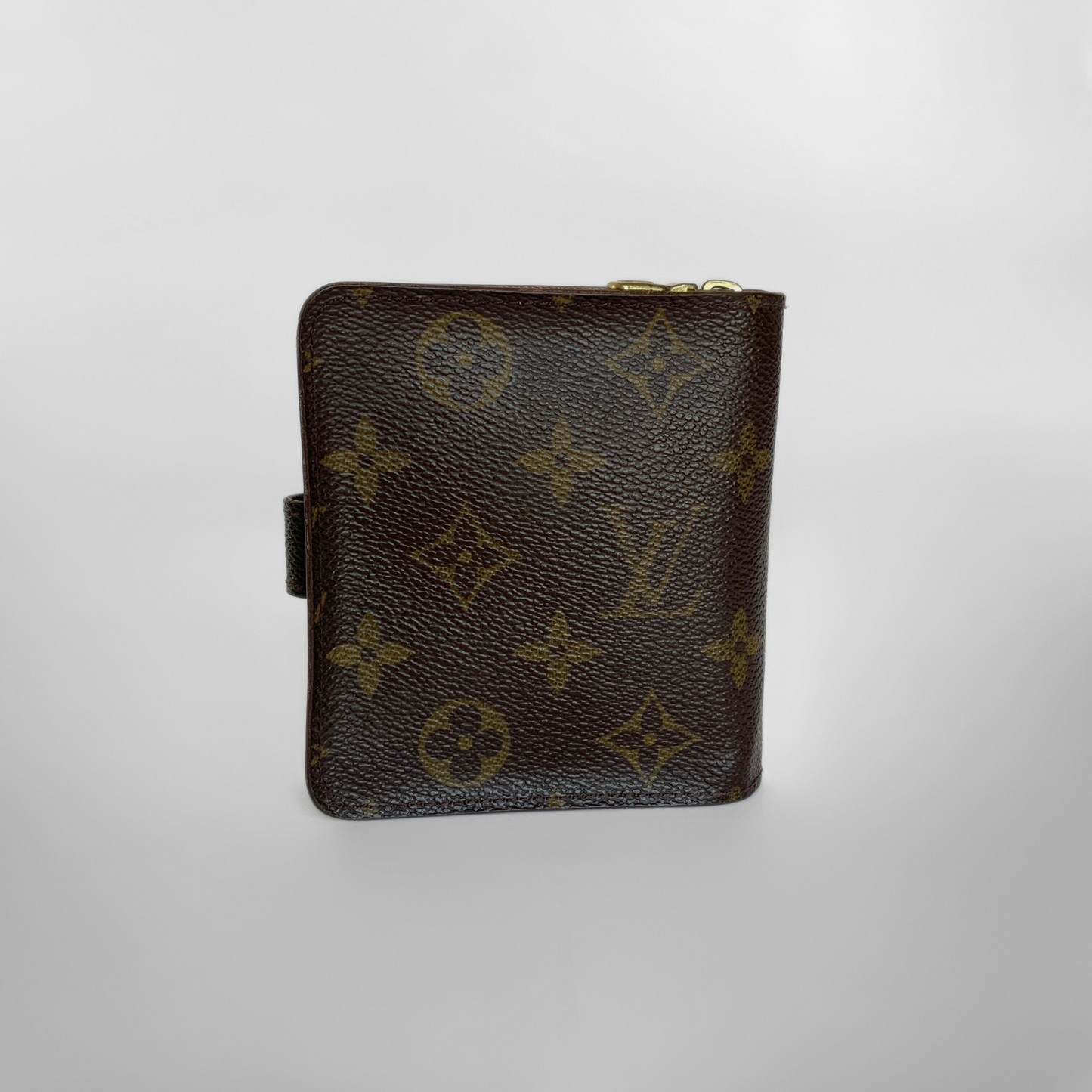 Brown leather wallet with monogram pattern on a light gray background