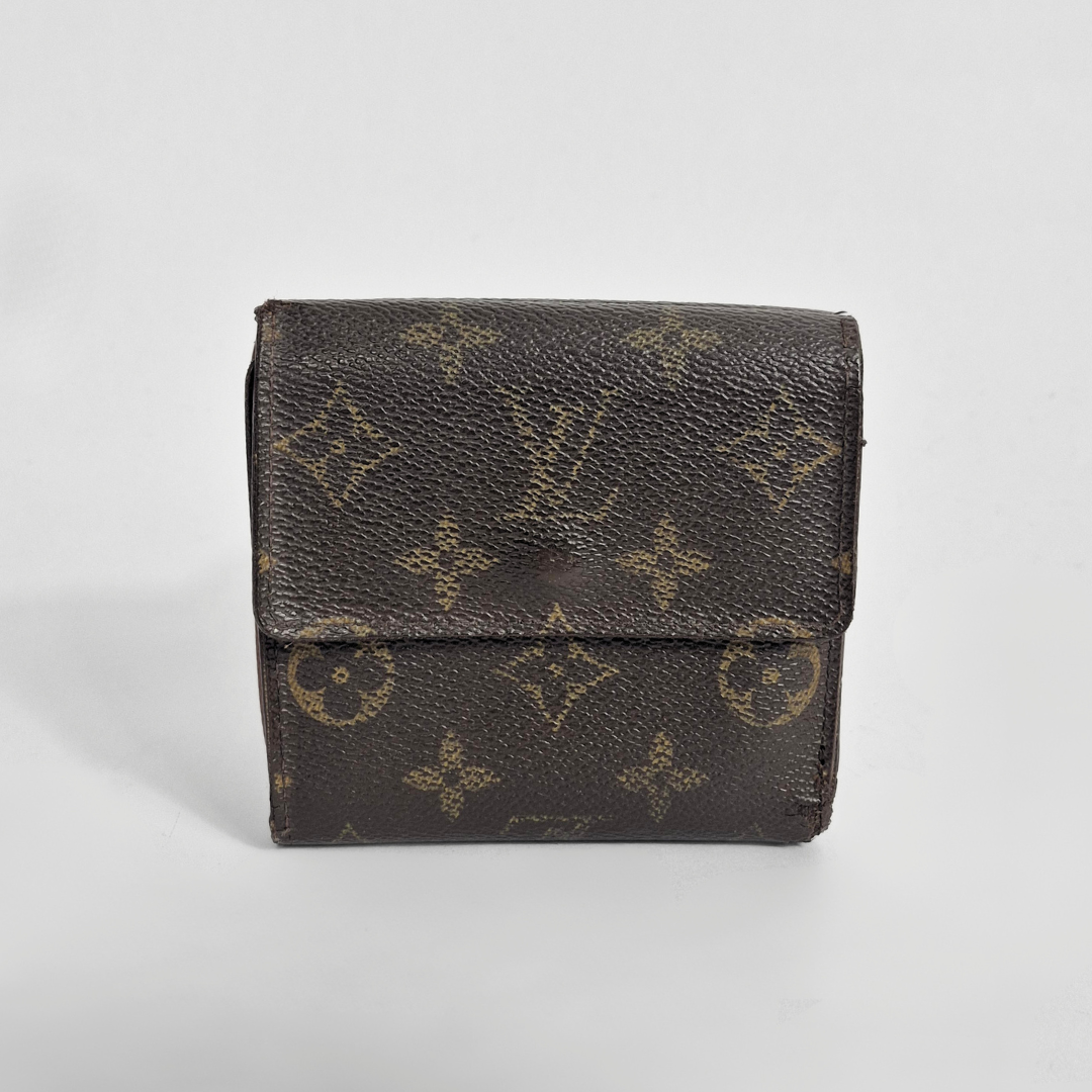 Brown wallet with monogram pattern on a light gray background