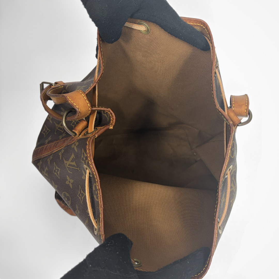 Louis Vuitton Petit Noe Monogram Canvas on a white background