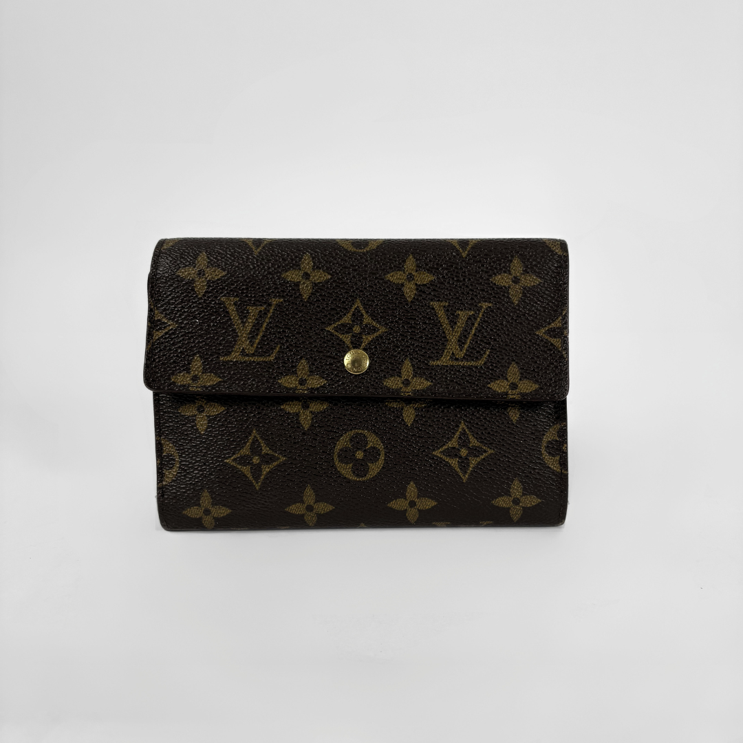Louis Vuitton International Wallet Medium on a white background
