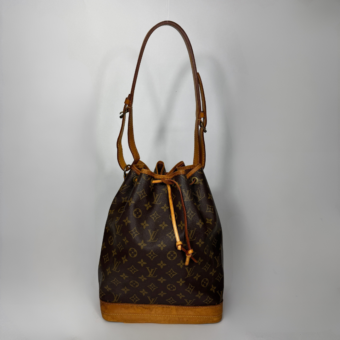 Louis Vuitton Petit Noe Monogram Canvas on a white background
