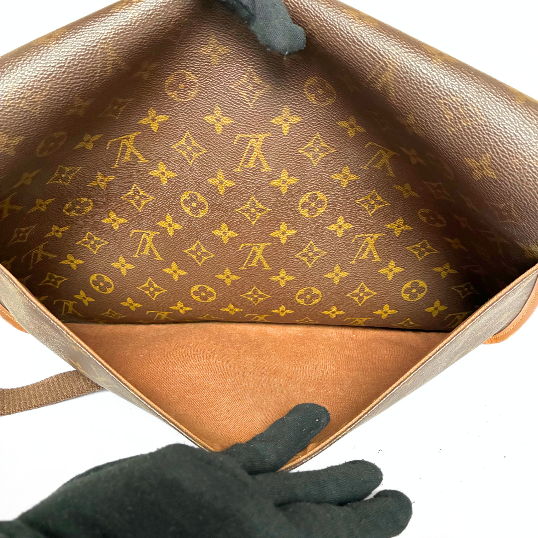 Louis Vuitton Gibecière GM monogram lærred